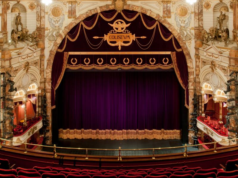 View of the London Coliseum stage with curtain down from the upper circle