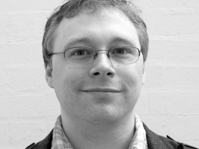 Black and white headshot of Gareth Fry facing the camera