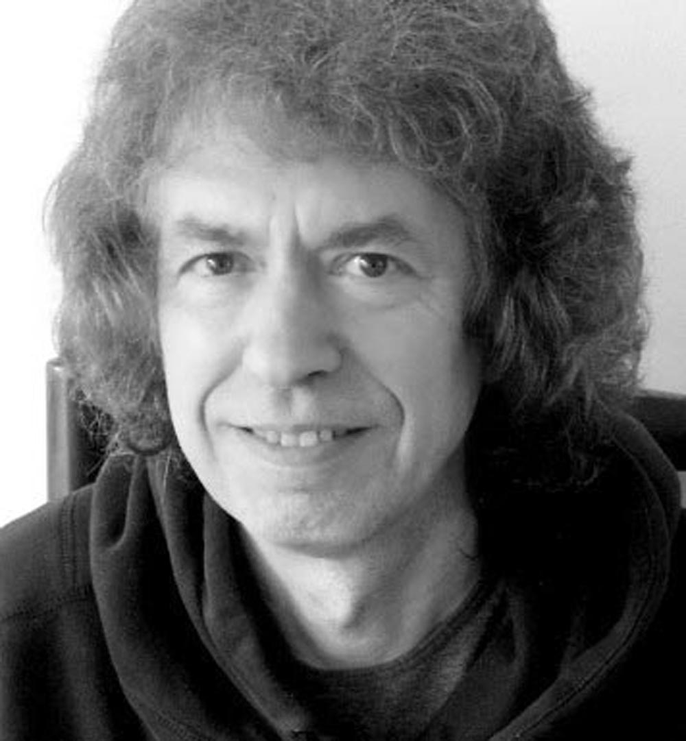 Black and white headshot of Stephen Jeffreys facing the camera