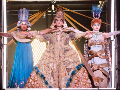 ENO Akhnaten 2023,-Nefertiti played by Chrystal E. Williams (L), Akhnaten played by Anthony Roth Costanzo (C), Queen Tye played by Haegee Lee (R). Image shot on 9th March 2023. © Belinda Jiao