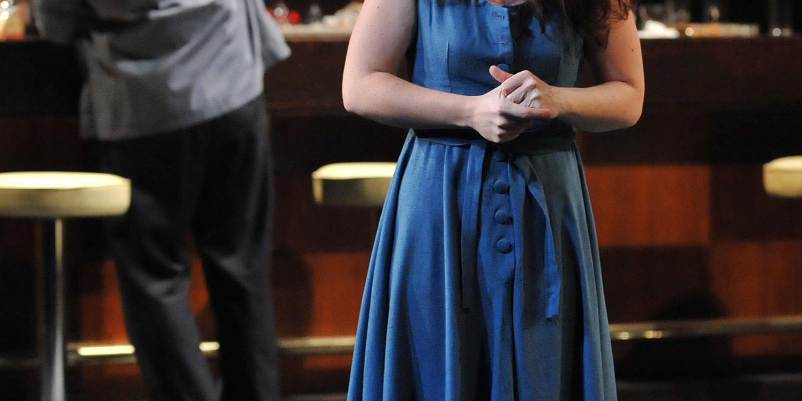 Katherine Whyte's blue dress and hands in ENOs Rigoletto