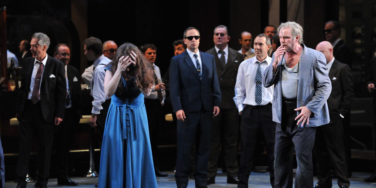 cast of rigoletto performing on stage with katherine whyte and anthony michaels-moore