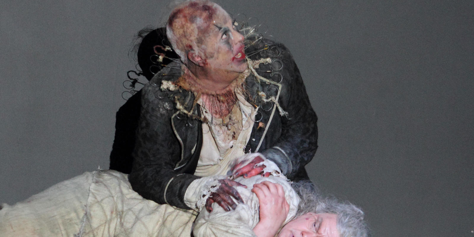 craig colclough and stuart skelton performing on stage in tristan and isolde
