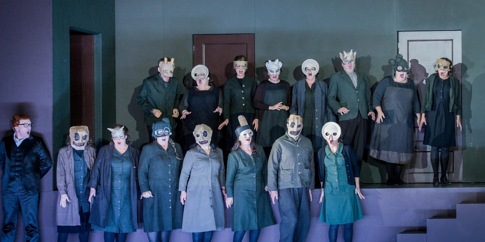 don giovanni chorus in scary masks on stage