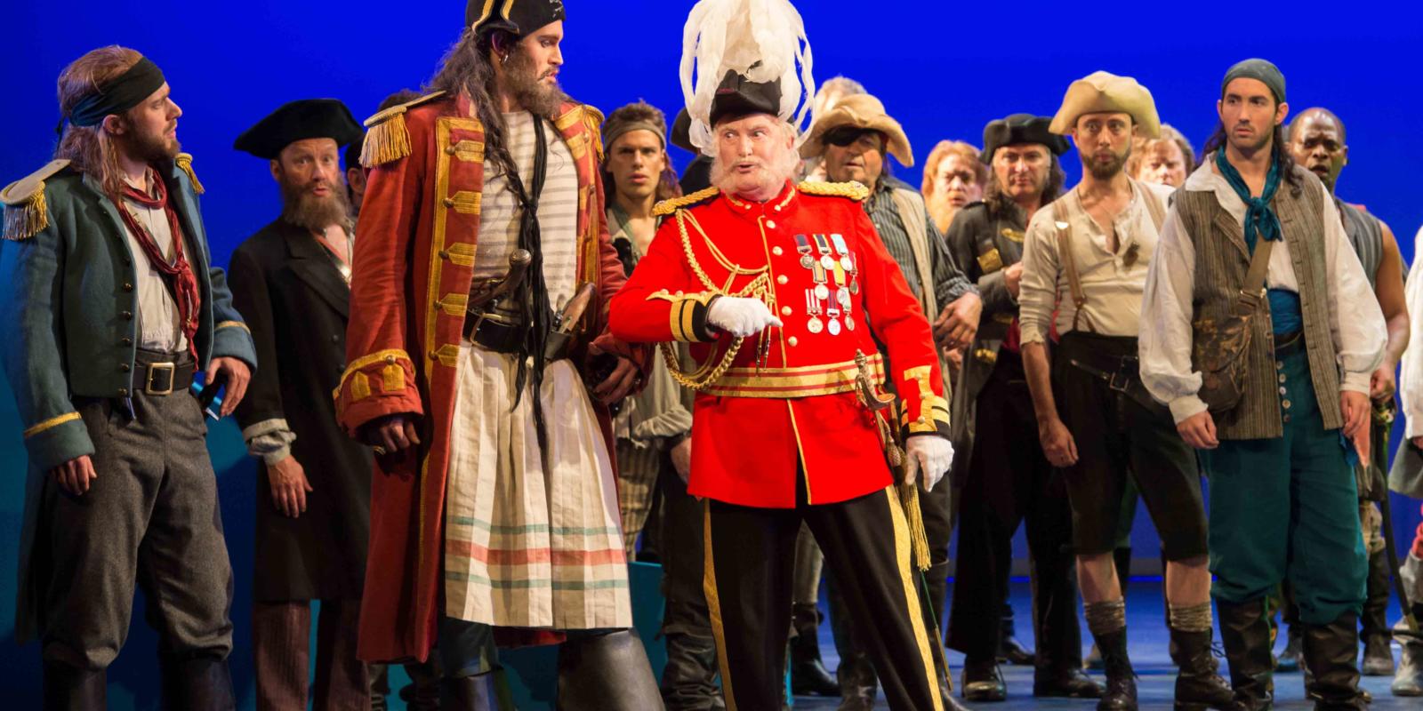 ENO's The Pirates of Penzance - Ashley Riches as The Pirate King and Andrew Shore as the Major-General. Photo by Tom Bowles