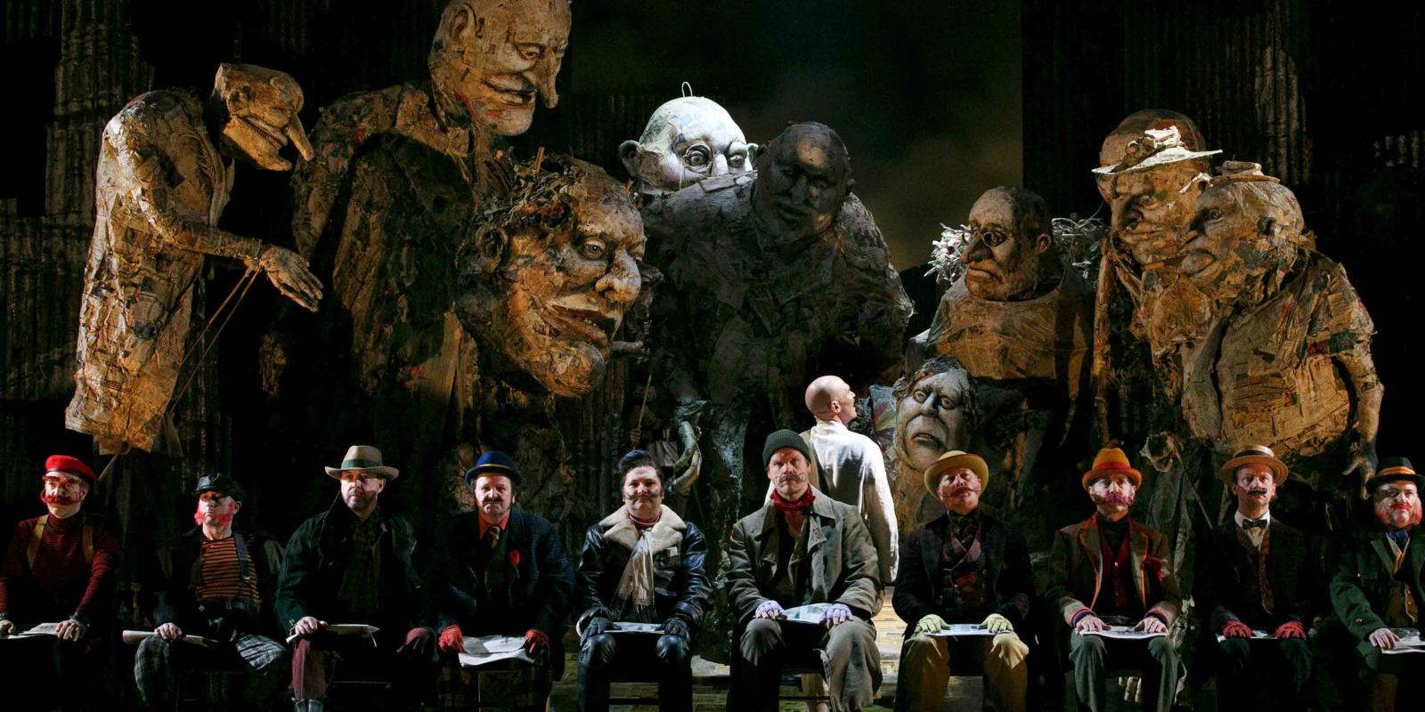 a group of men sitting on chairs