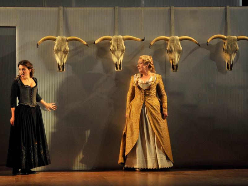 An image of Mary Bevan and Sarah Jane Brandon in Fiona Shaw's 2014 production of The Marriage of Figaro