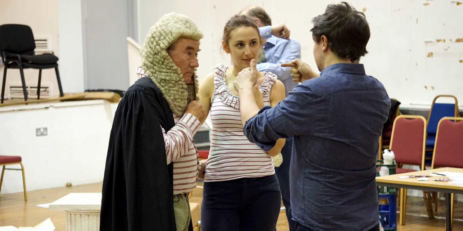 director talking to the cast