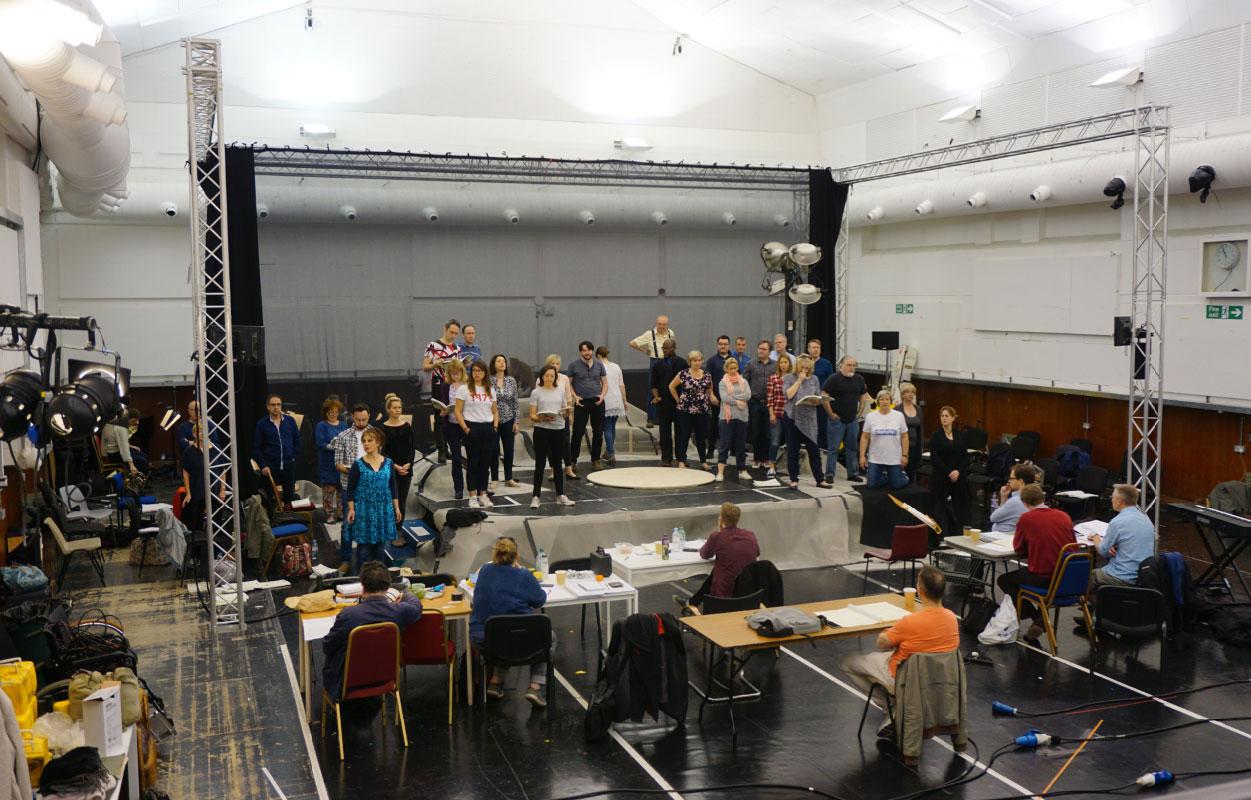 ENO cast and chorus in the rehearsal room