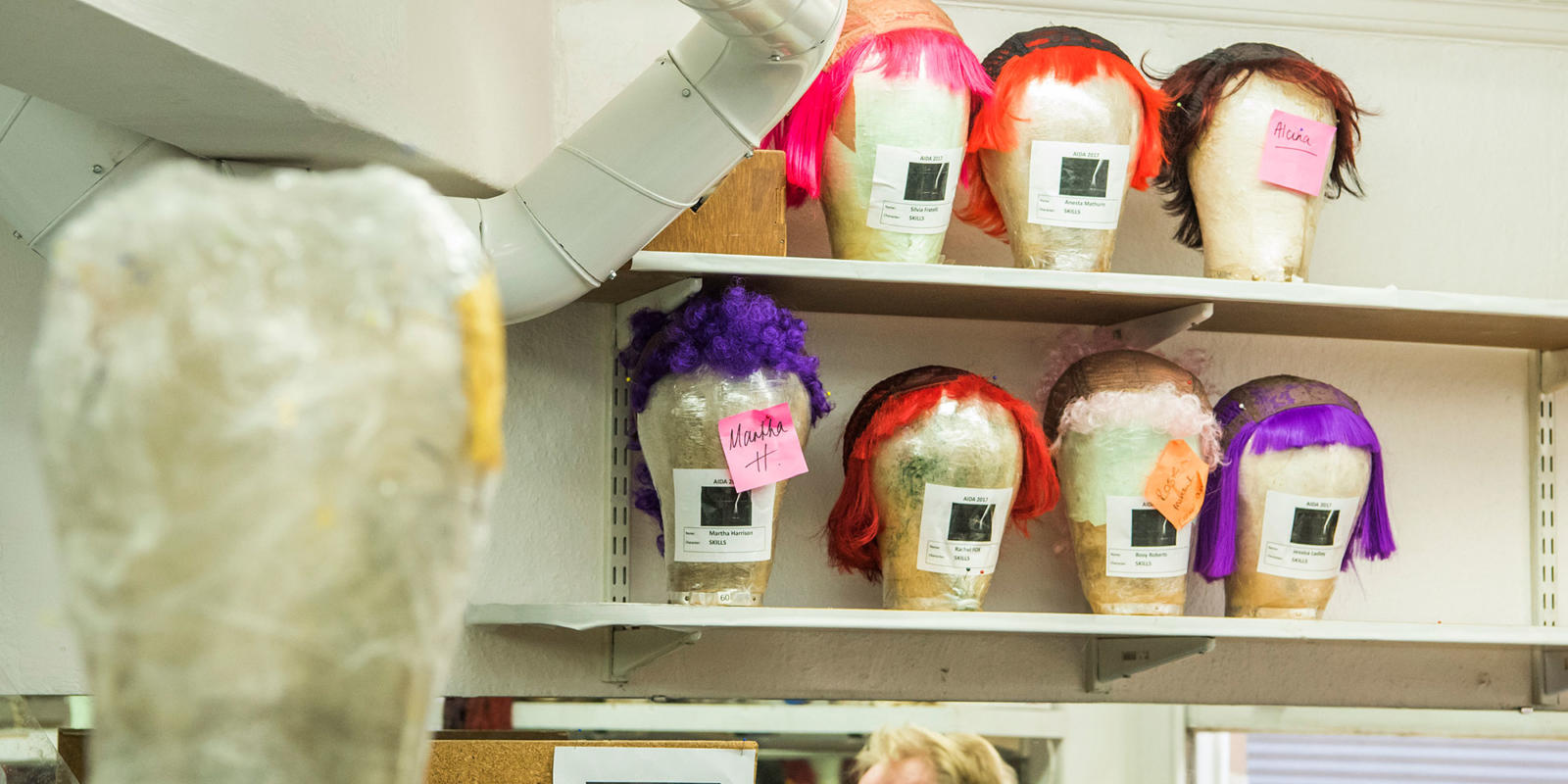 Wigs backstage ready to be worn by the acrobats (c) Tristram Kenton
