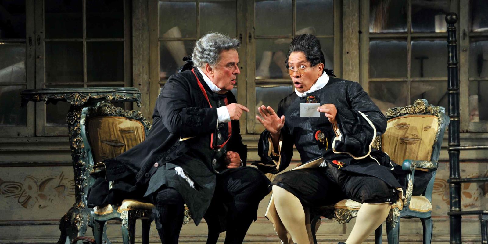ENO The Barber of Seville: Alan Opie and Eleazar Rodriguez in period costume on stage(c) Robbie Jack