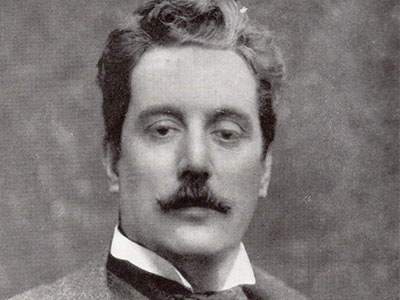 Black and white headshot of Giacomo Puccini