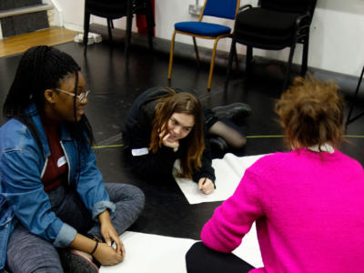 Sam and members of the ENO Youth Company creating ideas for their project