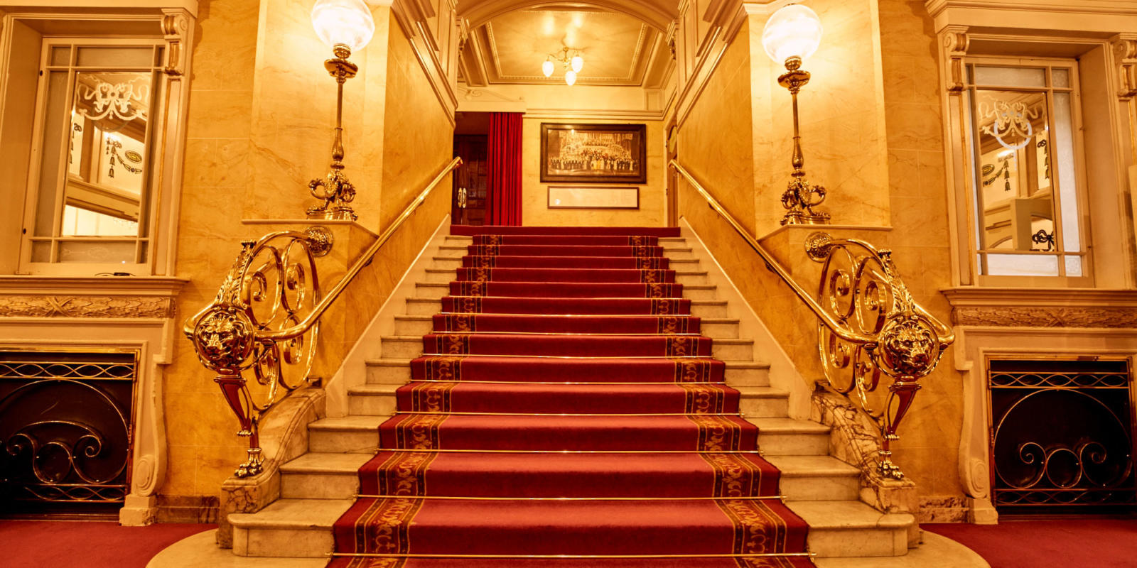 gold and red staircase in the london palladium