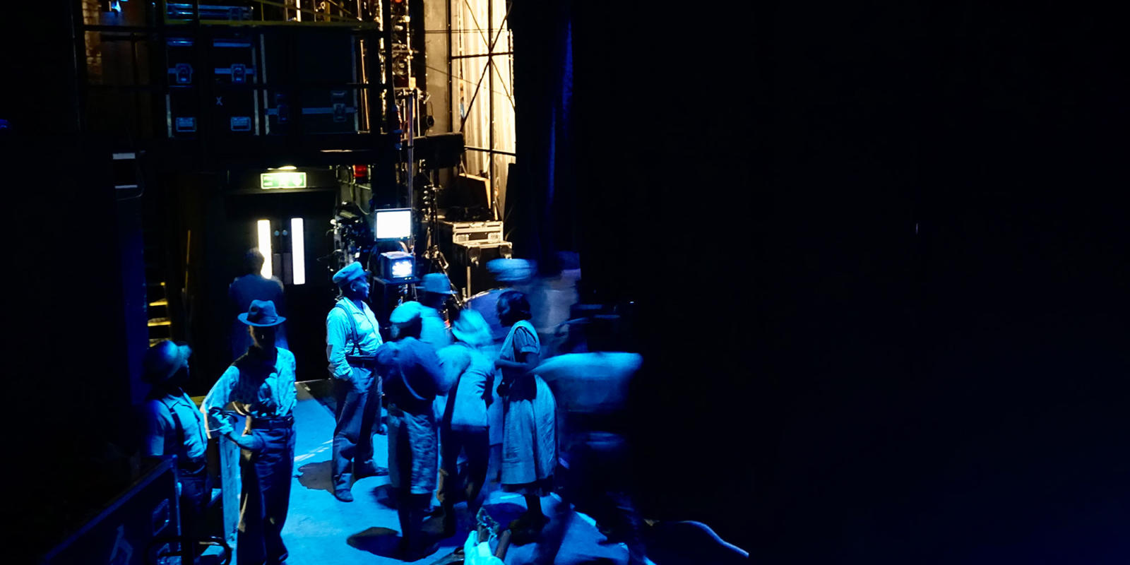 ENO Porgy and Bess: Members of the ensemble wait in the wings