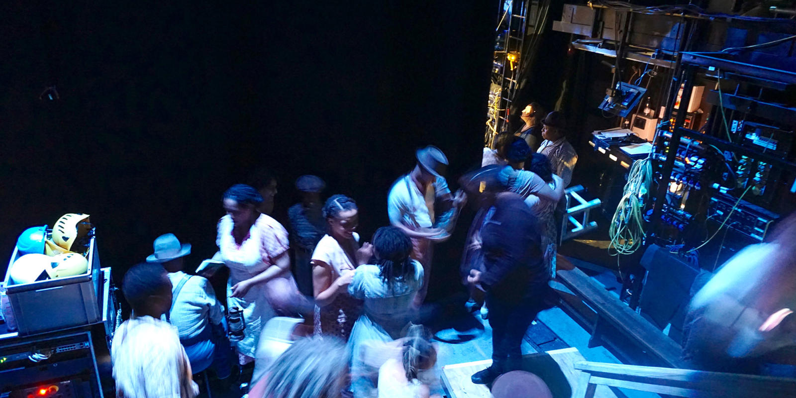 ENO Porgy and Bess: Members of the ensemble wait to go on stage for the thunderstorm scene