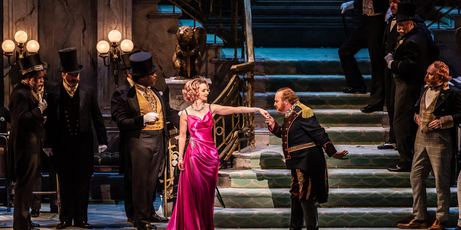 Andre Shore kissing the hand of Sarah Tynan in the Merry Widow