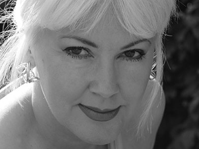 Close up portrait in black and white of Judith Howarth