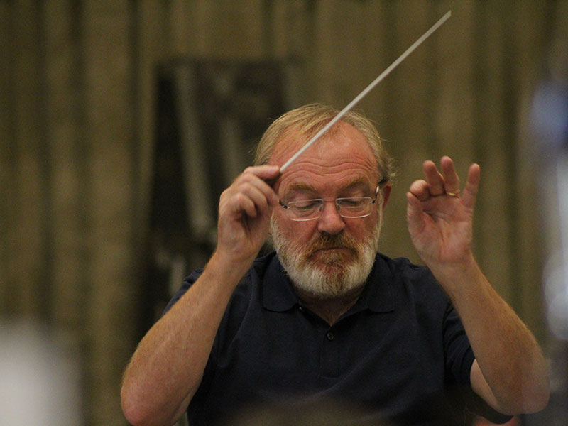 ENO1920 The Mask of Orpheus rehearsal gallery. Martyn Brabbins conducting during rehearsals