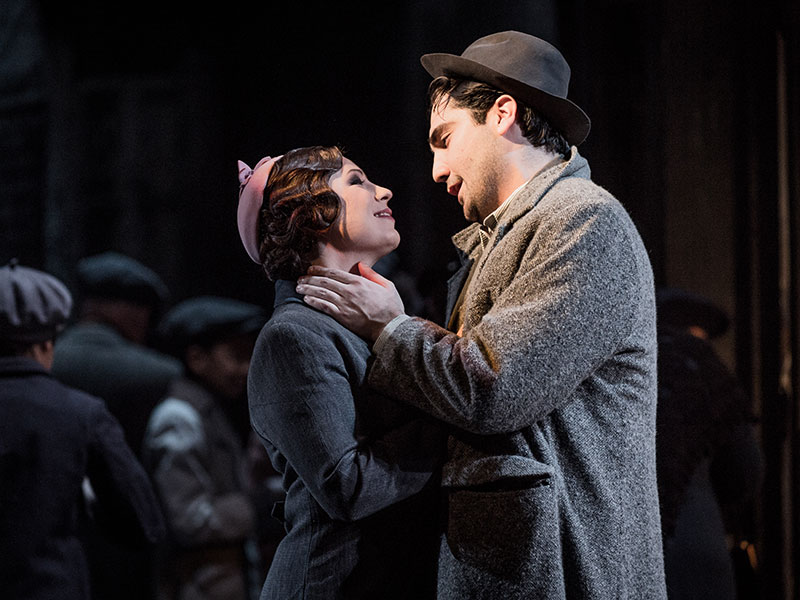 Mimi and Rodolfo gazing into each other's eyes