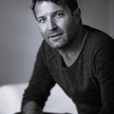 Black and white headshot image of Charles Rice looking to camera