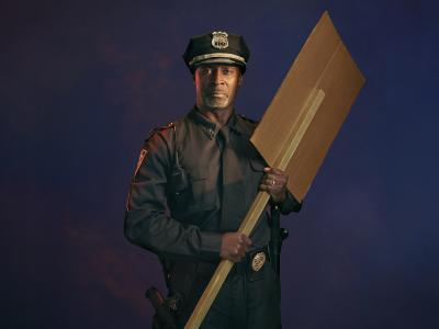 Blue | ENO 22/23 Season | Blue | ENO 22/23 Season | American Police officer holder a placard