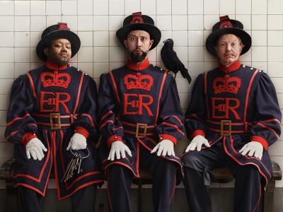 Three Yeomen of the Guard against a white tiled background | English National Opera