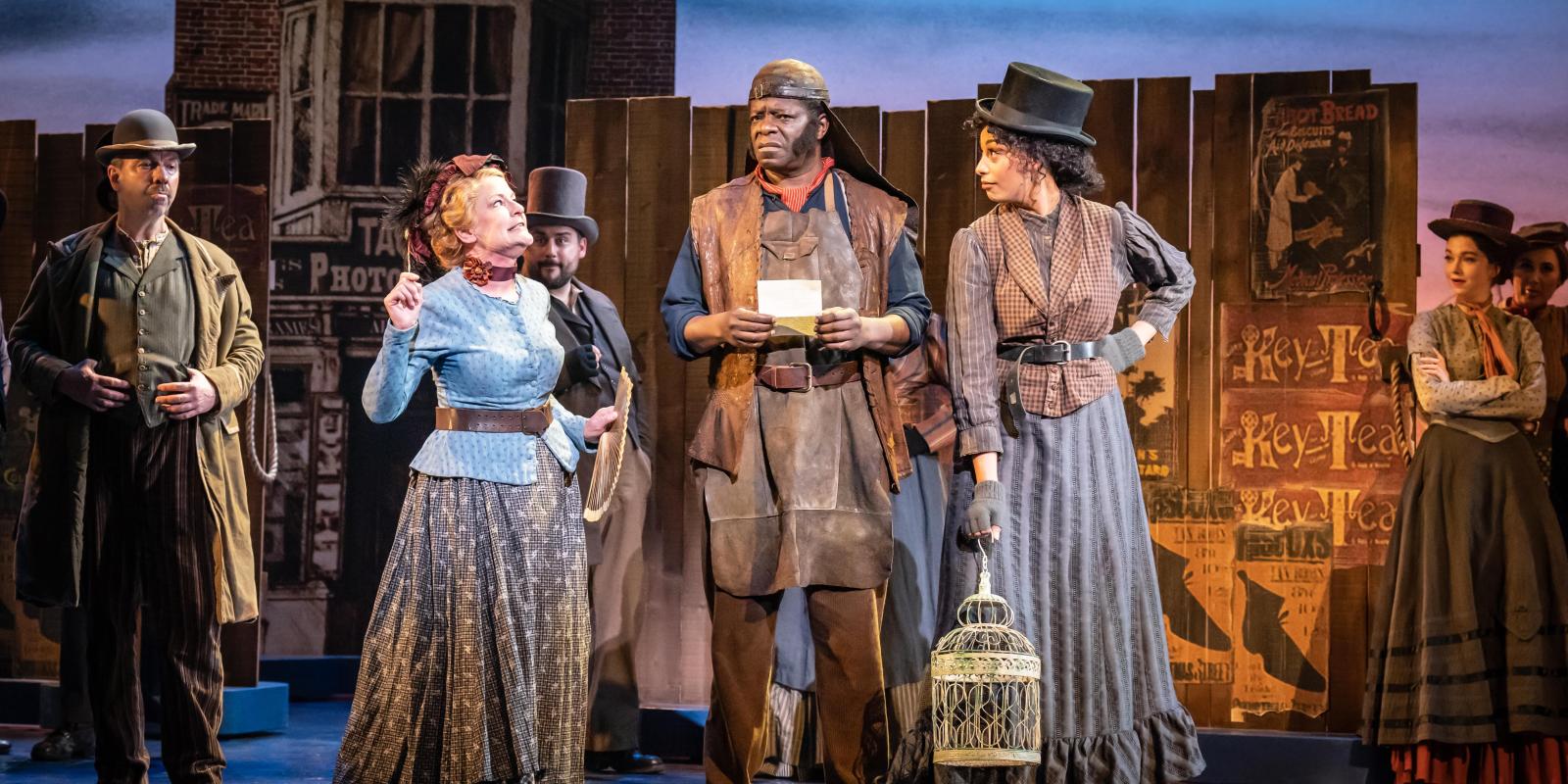 Stephen K Amos as Alfred P Doolittle with the company of My Fair Lady. Credit Marc Brenner-min
