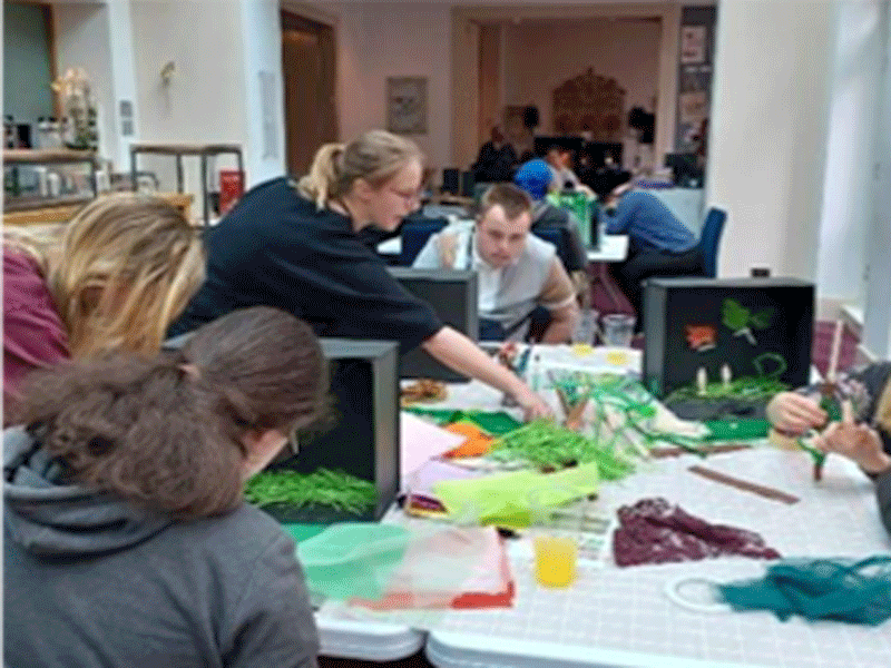 Participants at the I Am Festival take part in an arts and crafts activity