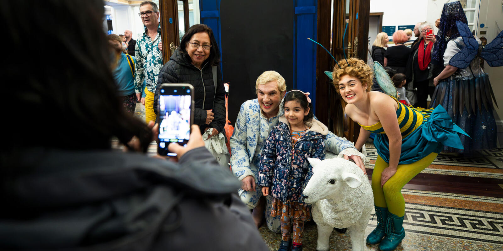 Marcus Farnsworth and Ellie Neate (and sheep) meeting a young audience member after the Relaxed performance of ENO's Iolanthe---Wednesday 25 October 2023 © Lloyd Winters