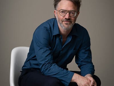 Colour Headshot of André de Ridder