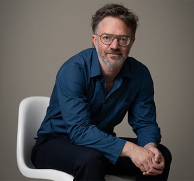 Colour Headshot of André de Ridder